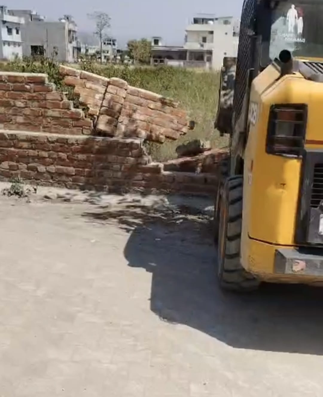 Bulldozer Action in Dehradun: Illegal Encroachment Removed from Municipal Road