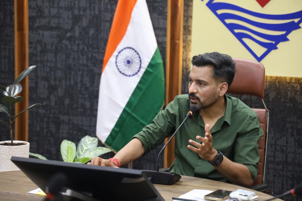 DM Warns NBFCs and Banks Against Exploiting Poor Borrowers in Dehradun